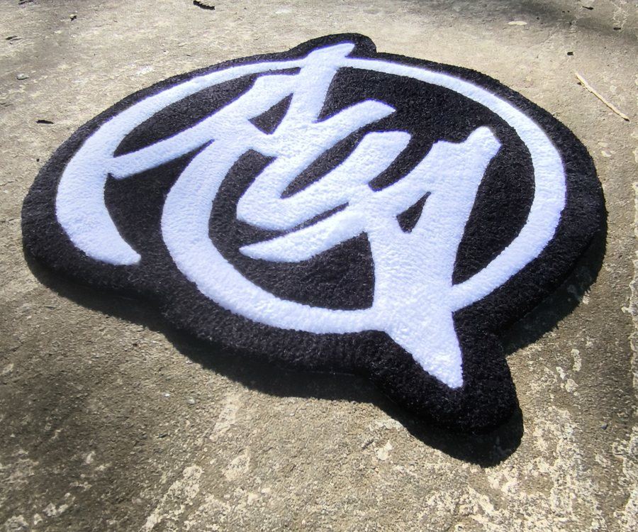 Tapete preto e branco com assinatura estilo grafite